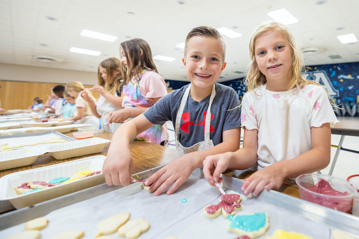 Campers mix fun and flour during the Cookies and Cupcakes session of EDUcamp, a hands-on learning experience for elementary-age students, Wednesday, May 28, 2025. (Photo by Derek Eckenroth)